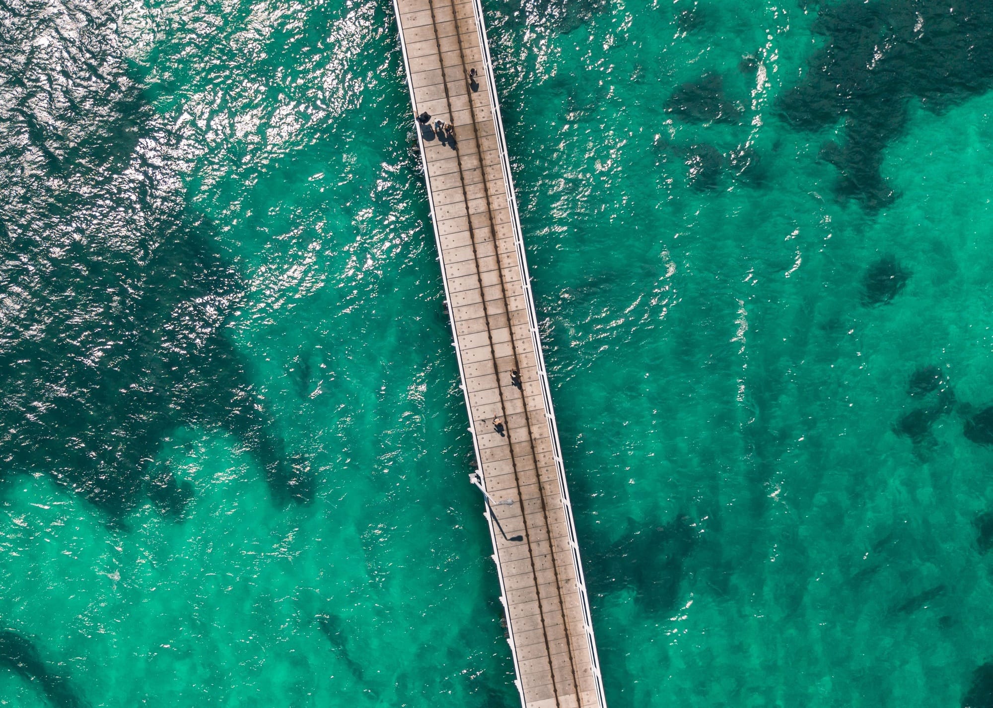 Aerial view of people walking on pier over sea, Hervey Bay QLD, Australia